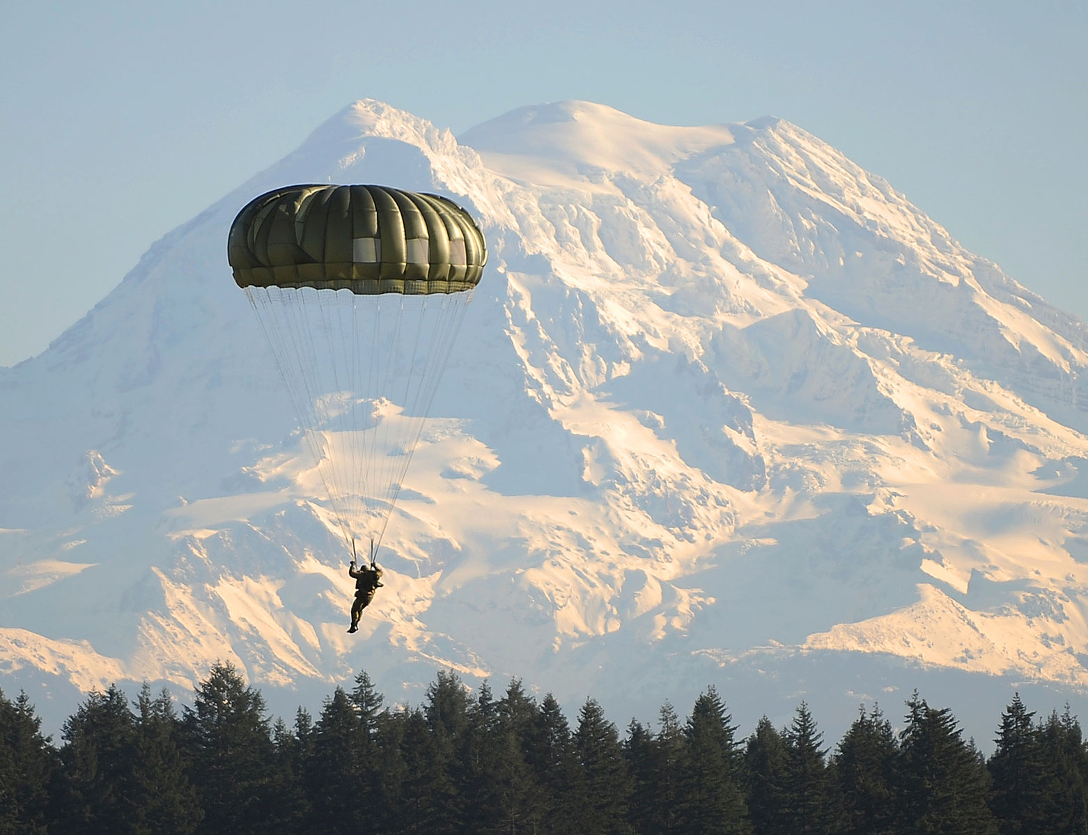 U.S. Army parachute jump with Mt. Rainier in the background